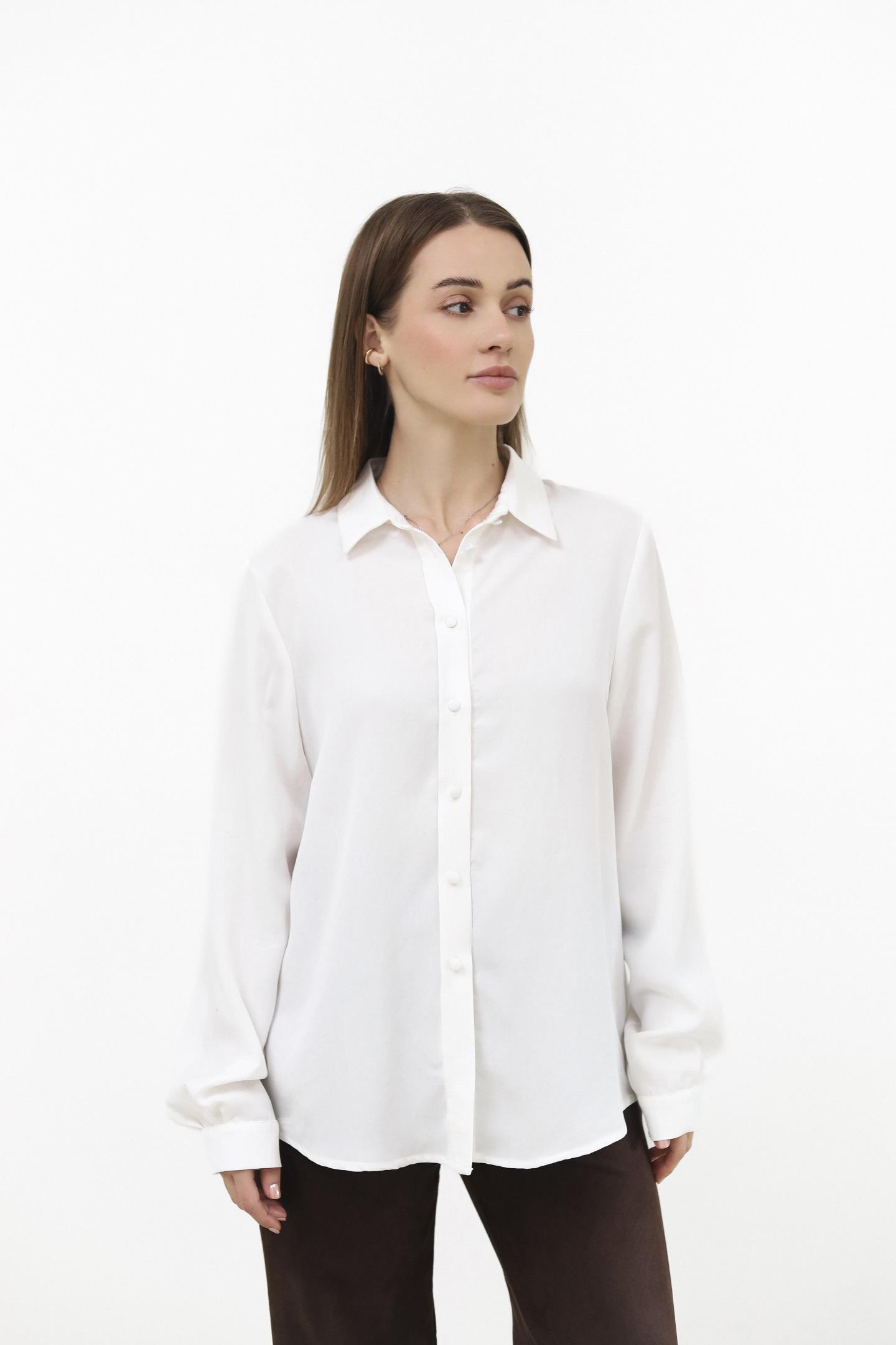 Жіноча блуза з подовженим силуетом Молоко