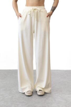 Жіночі штани з ніжного велюру Кремовий